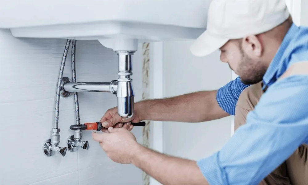 Contrôle de l’évacuation sous un lavabo — service de plombier à Berchem-Sainte-Agathe